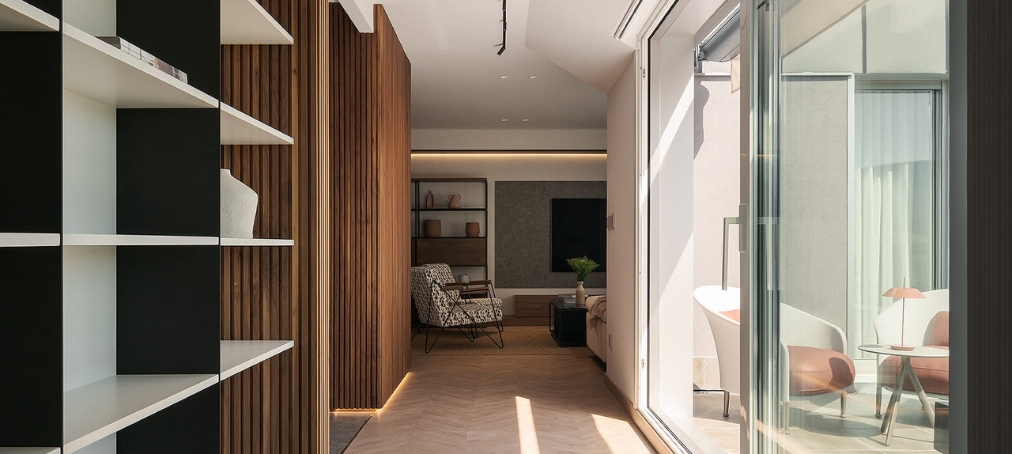 materiales-aislamiento-termico Un ático reformado con aislamiento térmico.